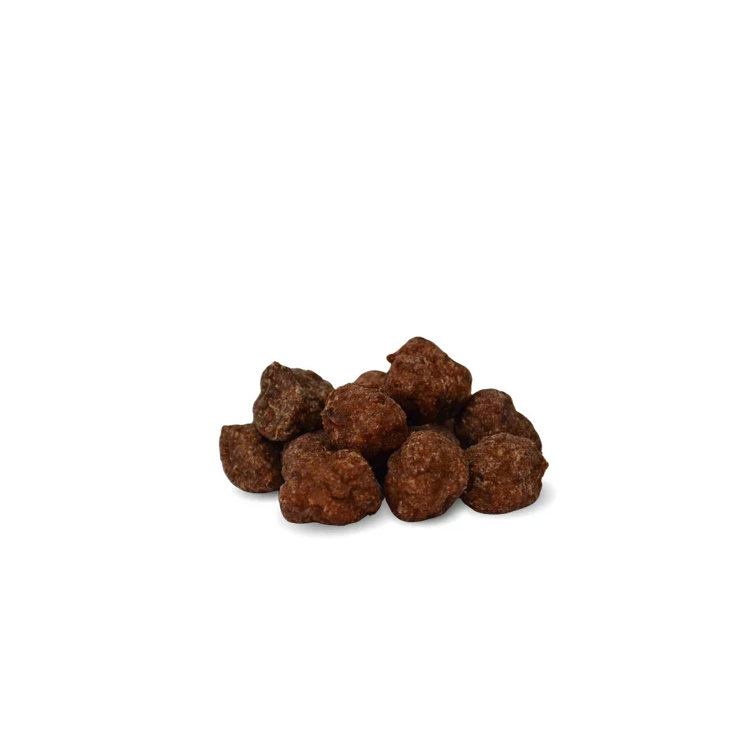 Brown Kangaroo dog food training treat pellets on a white background