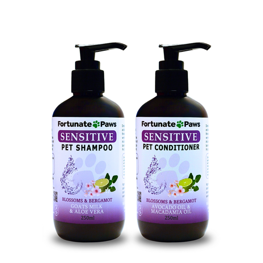 Two bottles of Fortunate Paws Sensitive Pet Shampoo and Conditioner on a white background