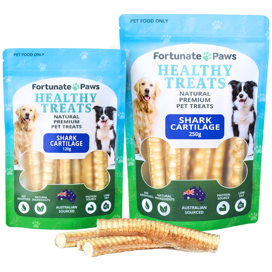 Two packages of Fortunate Paws healthy treats with shark cartilage on a white background